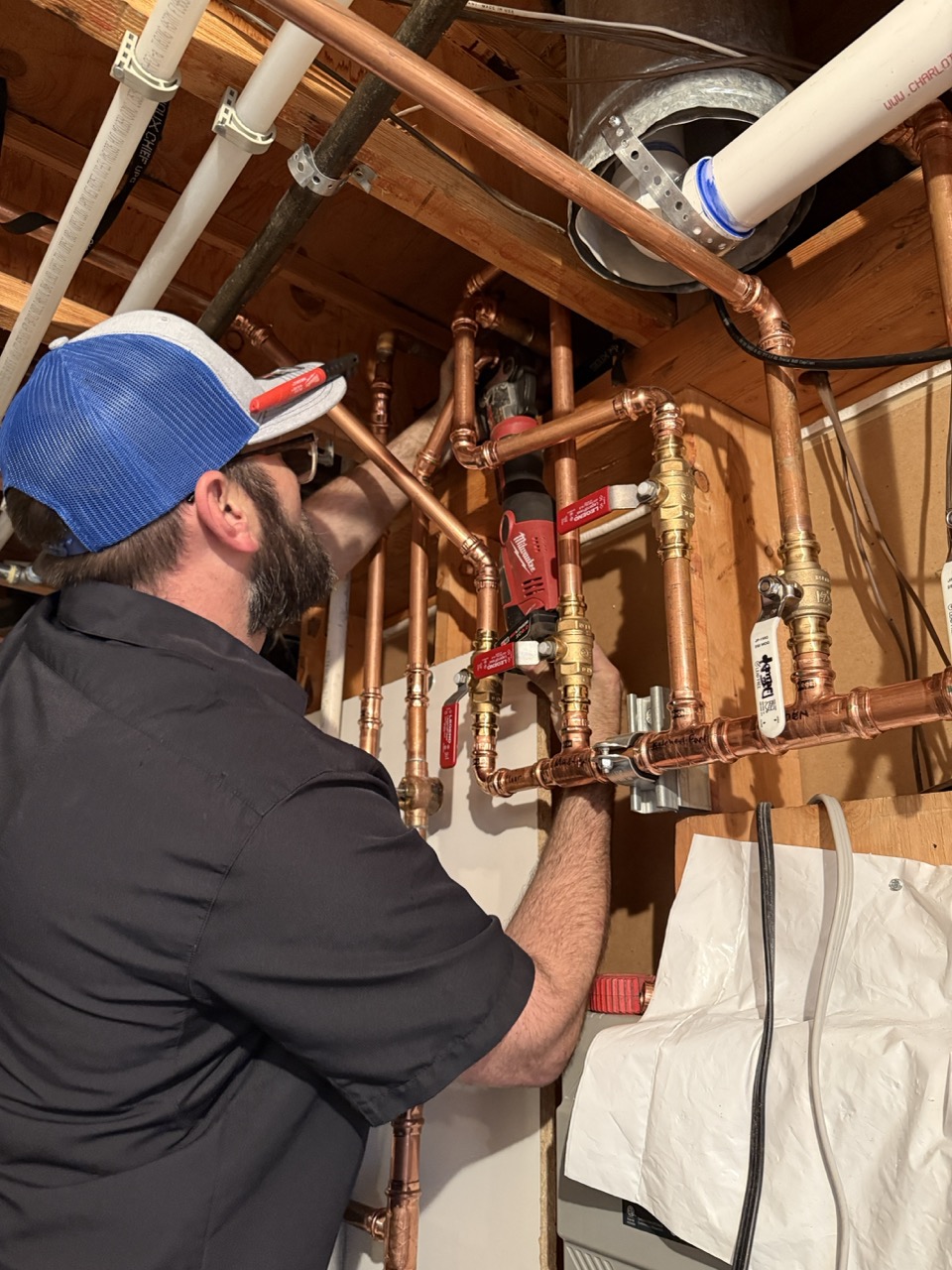 Canyon Plumbing technician installing plumbing
